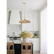 Odessa 1 Light 20.5" Pendant in Soft Gold in a room setting