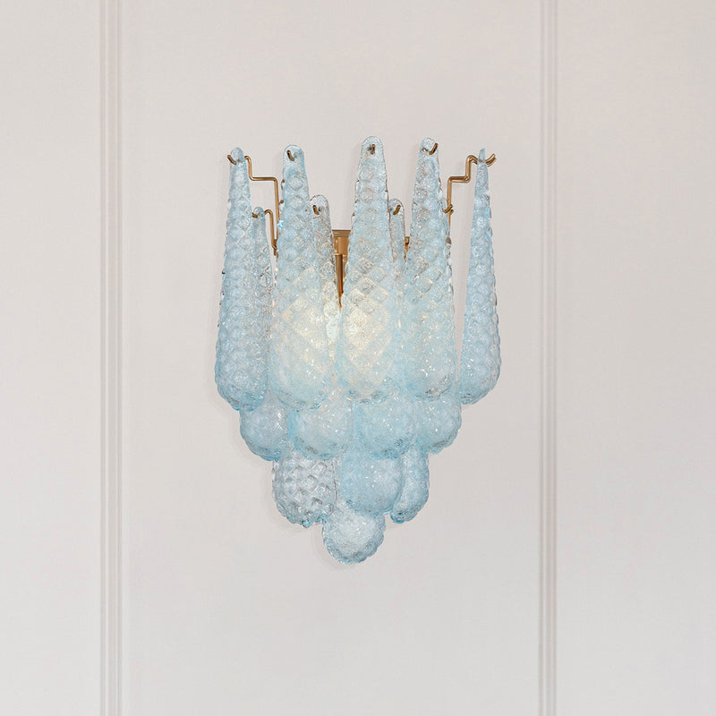 Ollie 2 Light 14" Sconce in Aged Brass in a room setting