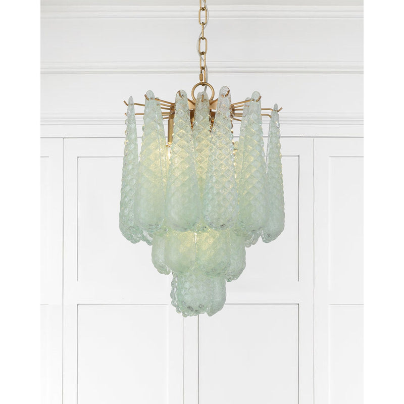 Ollie 4 Light 14.25" Pendant in Aged Brass in a room setting