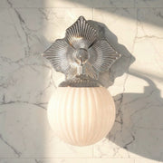 Orly 1 Light 7.5" Sconce in Polished Nickel in a room setting