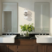Orly 2 Light 7.5" Sconce in Polished Nickel in a room setting