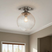 Orly 1 Light 10" Semi Flush Mount in Polished Nickel in a room setting