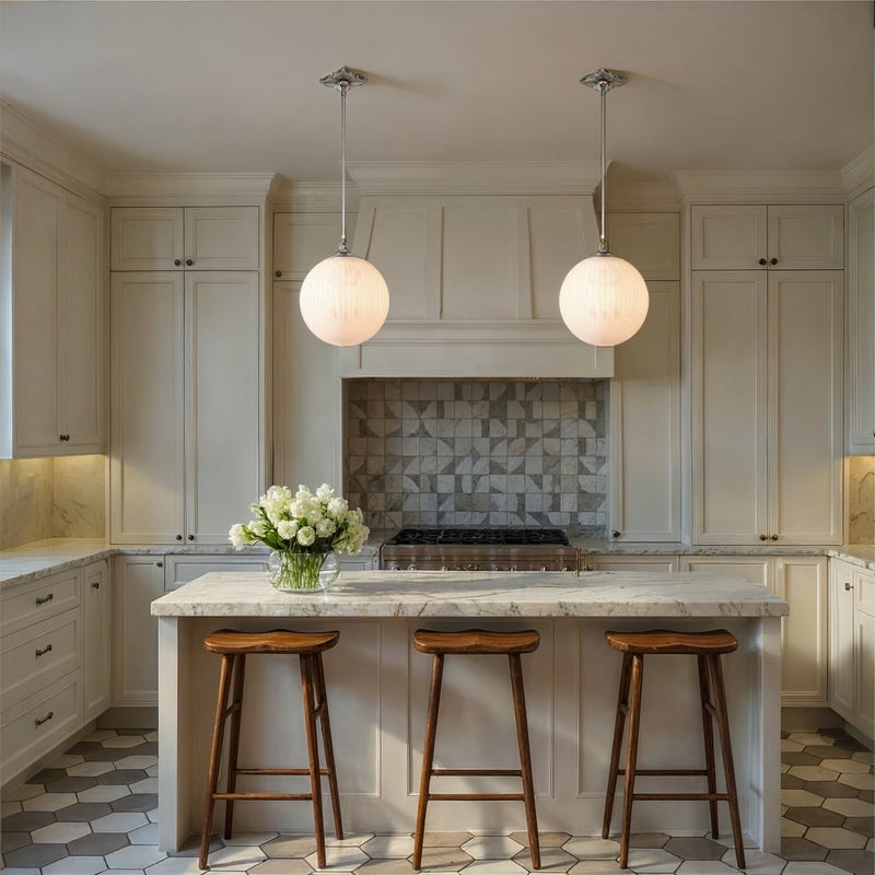 Orly 1 Light 14" Pendant in Polished Nickel in a room setting