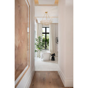 Palla 6 Light 24.5" Pendant in Antique Gold in a room setting