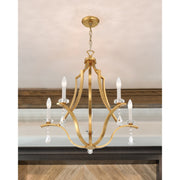 Perry 5 Light 25.5" Chandelier in Antique Gold in a room setting