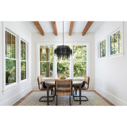 Poppy 6 Light 26.5" Pendant in Matte Black in a room setting