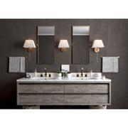 Renee 1 Light 10" Sconce in Aged Brass in a room setting