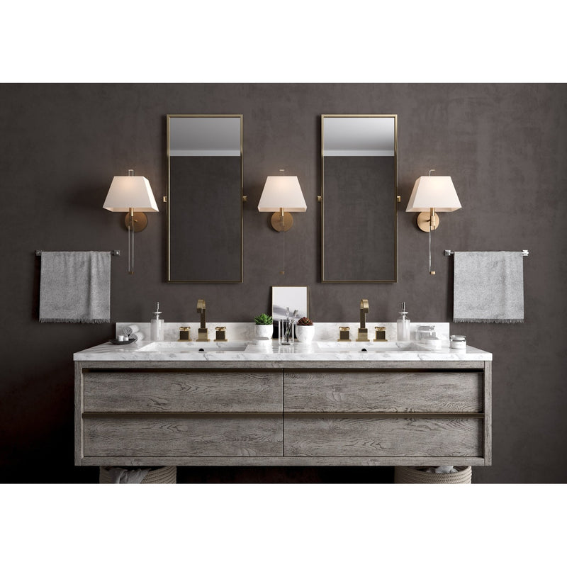 Renee 1 Light 10" Sconce in Aged Brass in a room setting