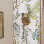 Riverdale 1 Light 6" Sconce in Aged Brass in a room setting