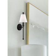 Riverdale 1 Light 6" Sconce in Black Forged in a room setting