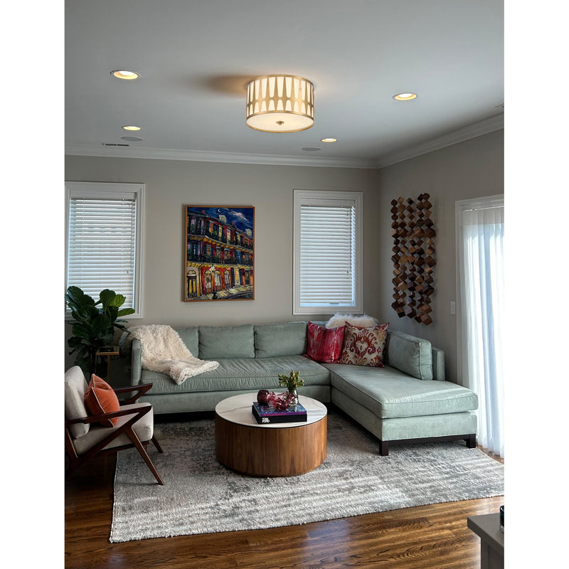 Royston 3 Light 18" Flush Mount in Antique Gold in a room setting