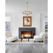 Seville 6 Light 28" Chandelier in Aged Brass in a room setting