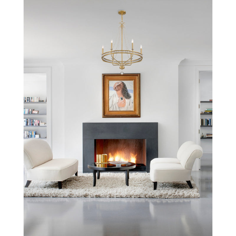 Seville 6 Light 28" Chandelier in Aged Brass in a room setting