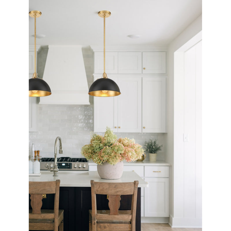 Soto 1 Light 12" Pendant in Matte Black + Antique Gold in a room setting