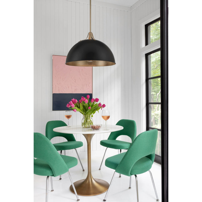 Soto 3 Light 23.5" Pendant in Matte Black + Antique Gold in a room setting