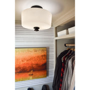 Travis 2 Light 12.5" Semi Flush Mount in Black Forged in a room setting