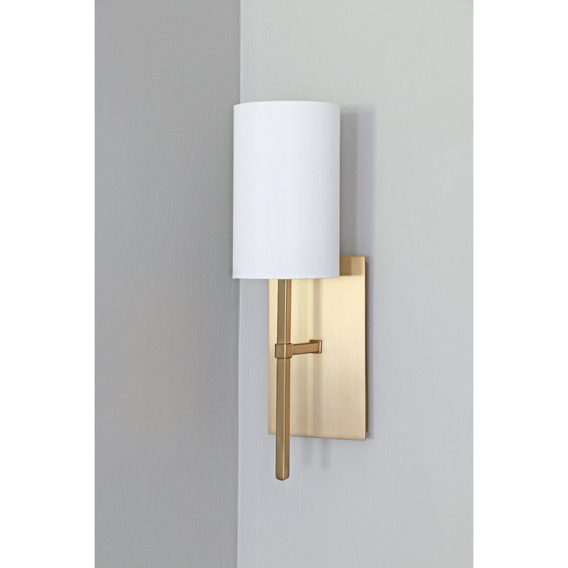 Veronica 1 Light 5" Sconce in Aged Brass in a room setting