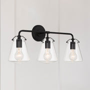 Voss 3 Light 25" Bathroom Vanity in Matte Black in a room setting