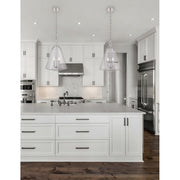 Voss 4 Light 15.25" Pendant in Polished Nickel in a room setting