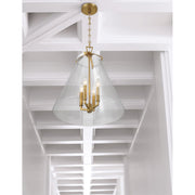 Voss 4 Light 18" Pendant in Luxe Gold in a room setting