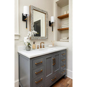 Weston 1 Light 5.5" Sconce in Black + Antique Gold in a room setting