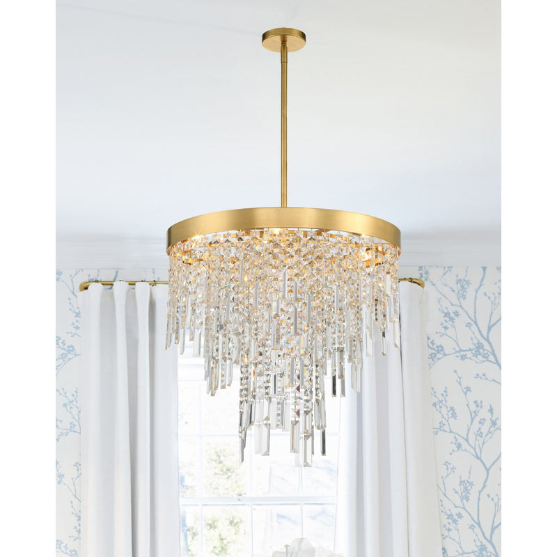 Winfield 6 Light 24" Pendant in Antique Gold in a room setting