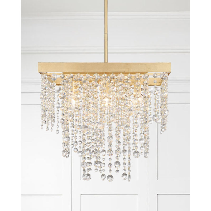 Winham 8 Light 22" Chandelier in Antique Gold in a room setting
