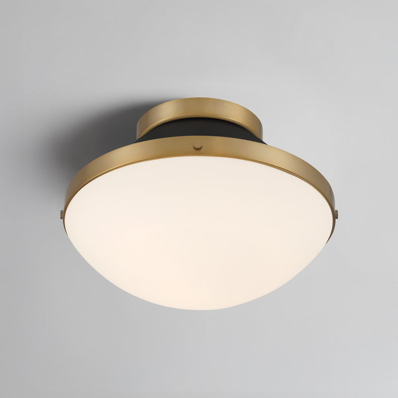 Xander 1 Light 12.25" Flush Mount in Vibrant Gold + Matte Black in a room setting