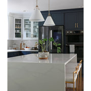 Xavier 1 Light 12" Pendant in Vibrant Gold in a room setting