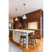 Xavier 1 Light 12" Pendant in Vibrant Gold in a room setting