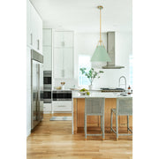 Xavier 3 Light 16" Pendant in Vibrant Gold in a room setting