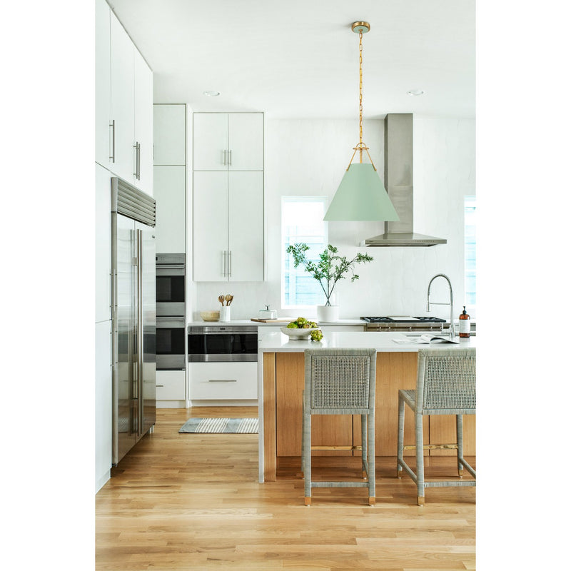 Xavier 3 Light 16" Pendant in Vibrant Gold in a room setting