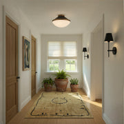 Xavier 1 Light 6" Sconce in Matte Black in a room setting