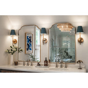 Xavier 1 Light 6" Sconce in Vibrant Gold in a room setting
