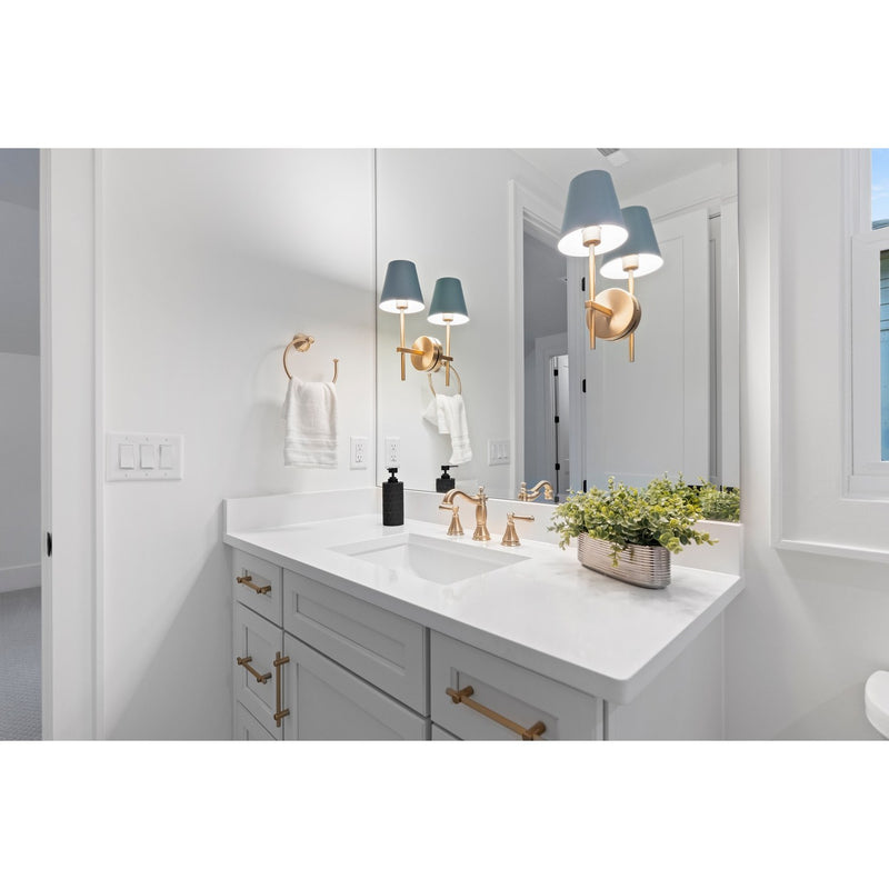 Xavier 1 Light 6" Sconce in Vibrant Gold in a room setting