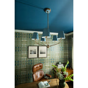 Xavier 5 Light 28" Chandelier in Vibrant Gold in a room setting