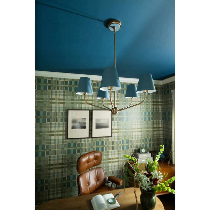 Xavier 5 Light 28" Chandelier in Vibrant Gold in a room setting