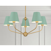 Xavier 5 Light 28" Chandelier in Vibrant Gold in a room setting
