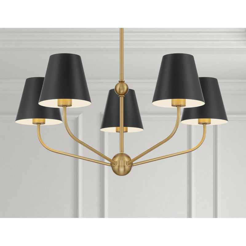 Xavier 5 Light 28" Chandelier in Vibrant Gold in a room setting