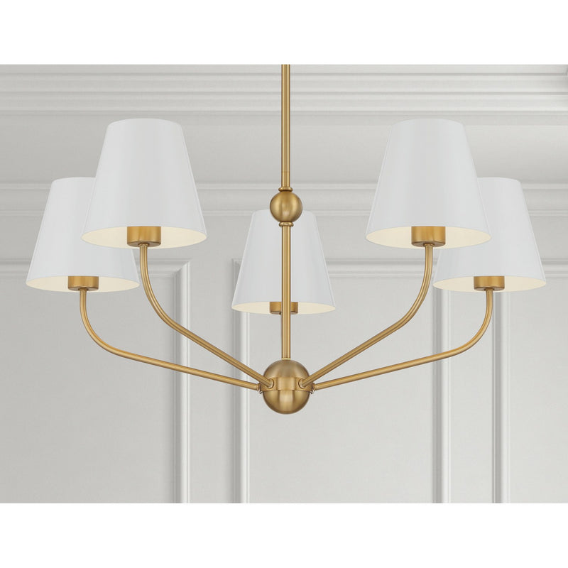 Xavier 5 Light 28" Chandelier in Vibrant Gold in a room setting
