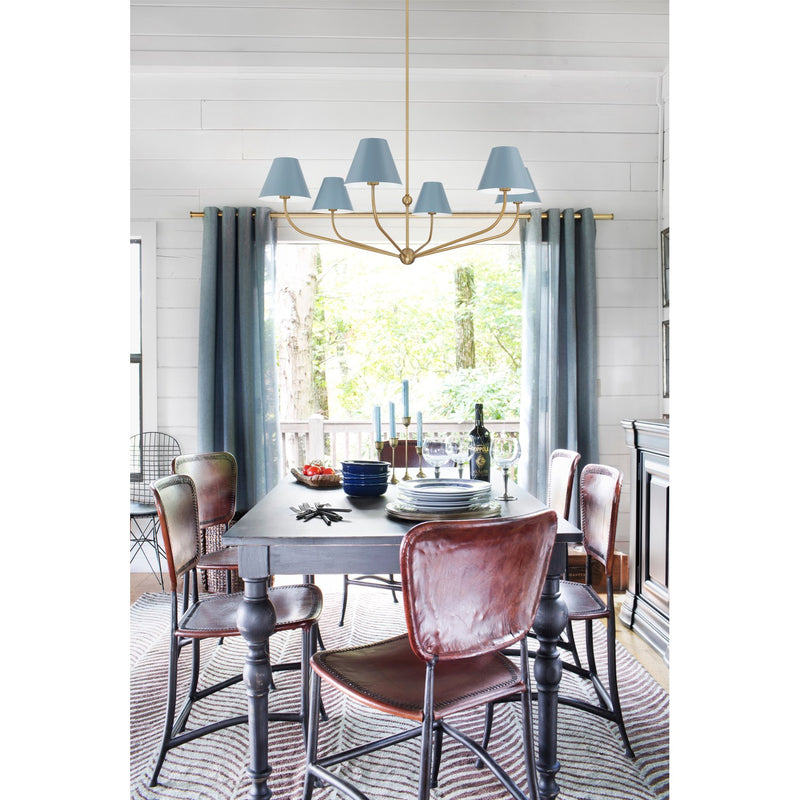 Xavier 6 Light 48" Chandelier in Vibrant Gold in a room setting