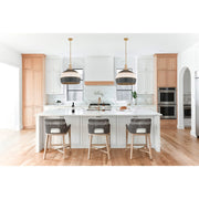 Zanzibar 5 Light 21" Pendant in Soft Gold + Matte Black in a room setting