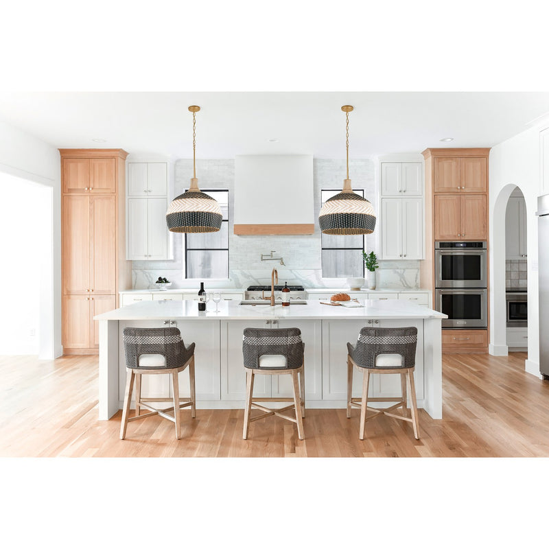 Zanzibar 5 Light 21" Pendant in Soft Gold + Matte Black in a room setting