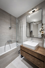 Liam 1 Light 18" Vanity in Matte Black in a room setting