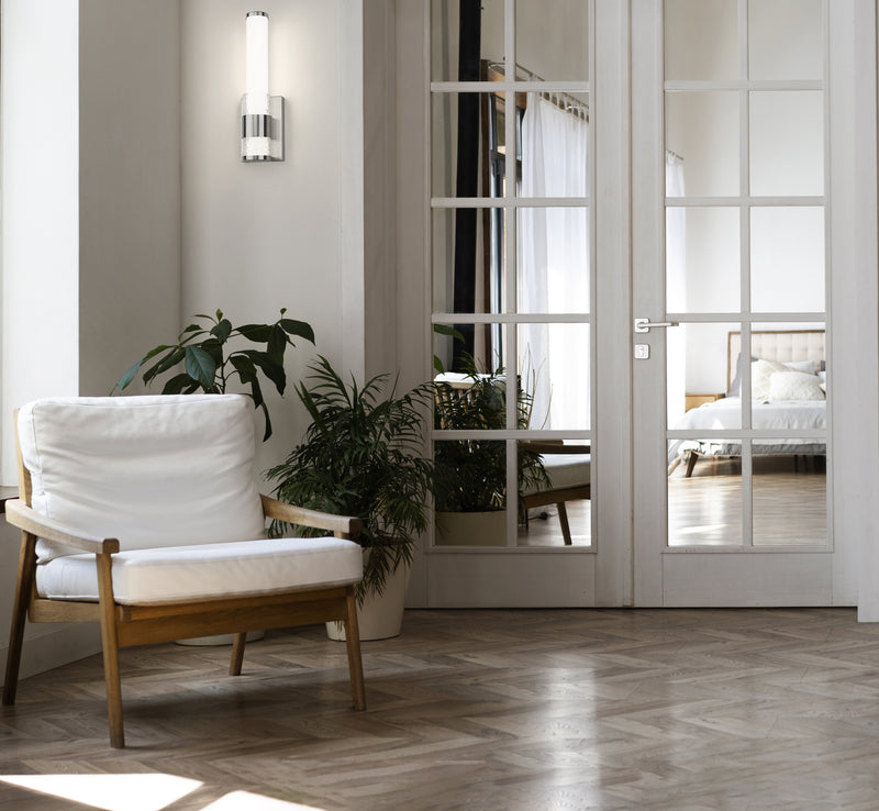 Egon 1 Light 4.75" Wall Sconce in Brushed Nickel in a room setting
