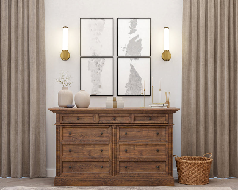 Solange 1 Light 4.75" Wall Sconce in Modern Gold in a room setting
