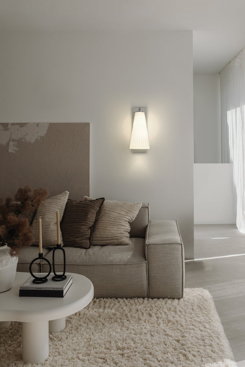 Farrell 1 Light 7.25" Wall Sconce in Brushed Nickel in a room setting