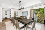 Kaden 10 Light 56" Linear Pendant in Matte Black in a room setting