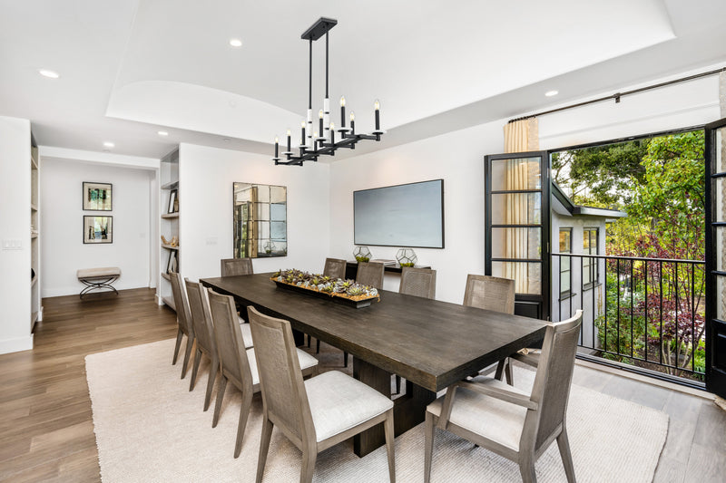 Kaden 10 Light 56" Linear Pendant in Matte Black in a room setting