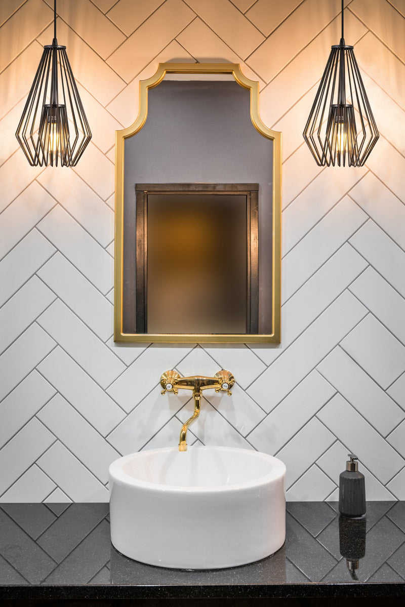 Quintus 1 Light 9.25" Pendant in Plated Bronze in a room setting